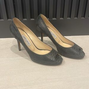 Jimmy Choo peep toe pumps. Snake embossed supple leather, wearable heel height